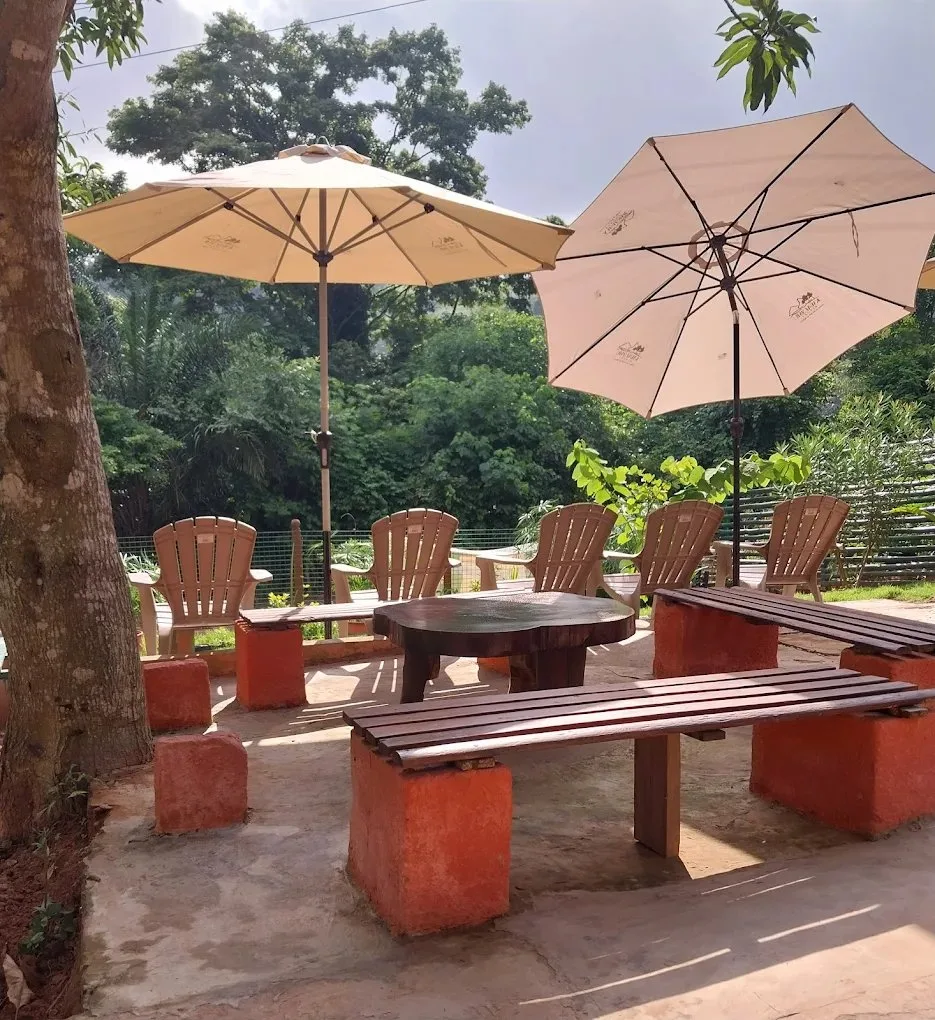Wooden bench seating with round table